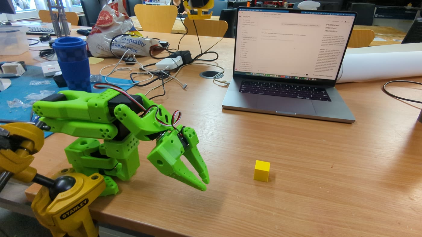 My SO-100 arm and the yellow cube